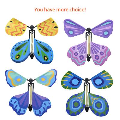 China Surprise Gift Magic Flying Plastic And Paper Butterflies Card Elastic Band Butterfly Flying Surprise for sale