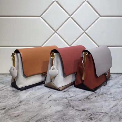 China New Color Collided Shoulder Bags  All Cowhide Original Hardware Inner Space Fully Adjustable Shoulder Strap for sale