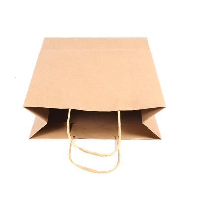 China BIODEGRADABLE custom paper wedding brown kraft paper china gift bag manufactures for sale