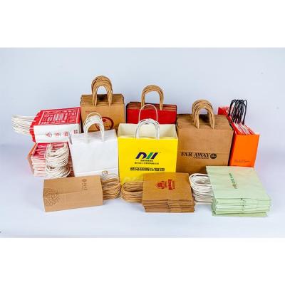 China Recyclable Party Paper Restaurant Cafe Restaurant Paper Handbags Bag Carrier Kraft Paper Cutlery Paper Bag Recyclable Customizable Logo for sale