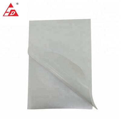 China Waterproof Silicone Coated Nature Woodfree Adhesive Paper in Sheets for Laser Offset Printing for sale