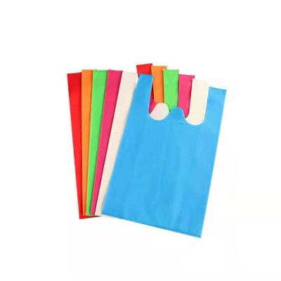 China Eco-Friendly Polypropylene Supermarket T-shirt Bag Wholesale Nonwoven Shopping W Cut Nonwoven Vest Bag Woven Fabric Vest Bag for sale