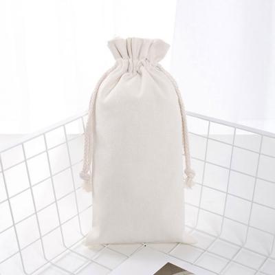 China Durable Folding Using Small Price Cloth Bag Silver Drawstring Bags For Packaging Drawstring for sale