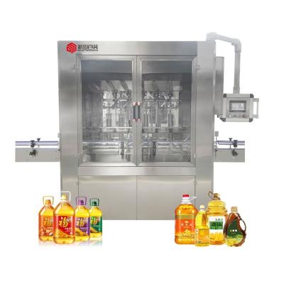 China New products food automatic hot frying oil bottle filling capping machine,lubricating oil filling line for sale