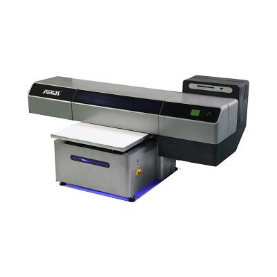 China Hotels Araras A2 size UV ​​digital flatbed printer with three print heads for white color and varnish can print certificate for sale