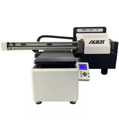 China Hotels UV Printer Available In All Sizes araras 1440dpi dx8 head phone case wood led uv flatbed printer for sale