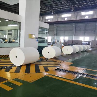 China Anticurl lowest price 70gsm woodfree offset printing paper in roll for sale