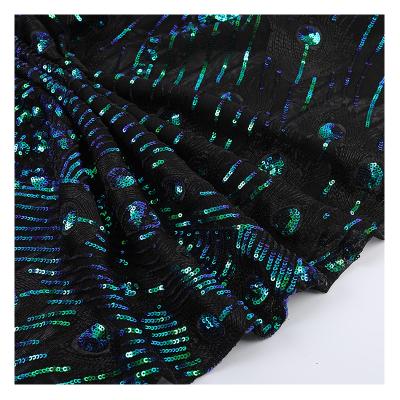 China Viable Mysterious Stretch Feather Sequin Fabric For Bridal Sequin Feathers Fabric Formal Dress for sale