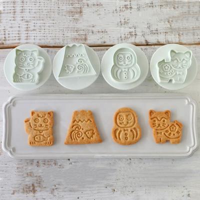 China Cotta Food Grade 4 Pcs ABS Japanese Style Japanese Style Mount Fuji Maneki Neko Daruma Dog Shaped Cookie Cutter Set for sale