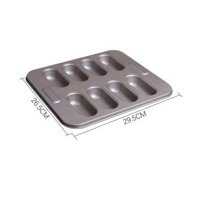 China Sustainable 8 Holes Gold And Black Carbon Steel Non-Stick Baking Hot Dog Tray 29.5*26.5cm Oval Baking Pan Mold for sale