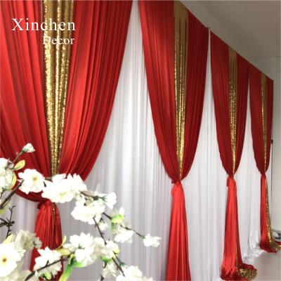 China Luxury Hot Sale Wedding Backdrop Double Drape Red Curtains Cross Drapery for sale