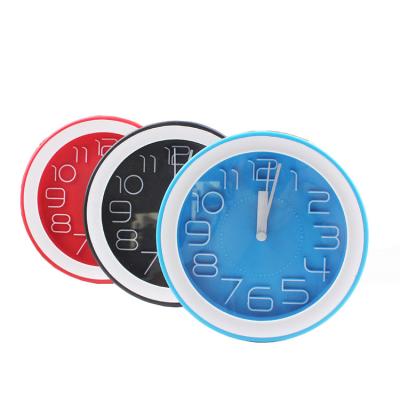 China Class Simple Circular Fashion Hanging Desk Alarm Clock For Home Decoration Room Decoration for sale