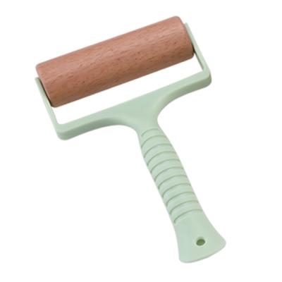 China Sustainable T Style Wooden Push Roller Hand Roller For Pastry Pin for sale