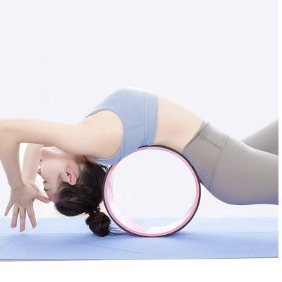 China Eco-Friendly Gym Fitness Resistance Band Pilates Back Roller Premium Yoga Prop Wheel for sale