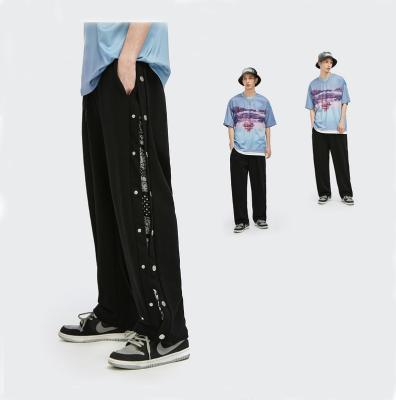 China Anti-Static Summer New Design Vintage Printed Mens Casual Pants With Buttons Plus Size Pants for sale