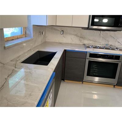 China Modern Custom White Kitchen Brazil Mont Blanc Quartzite Kitchen Granite Countertop for sale