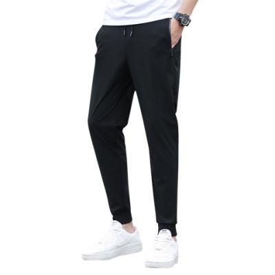 China Anti-wrinkle ice silk casual jogger pants stretch sports gym panties for men for sale