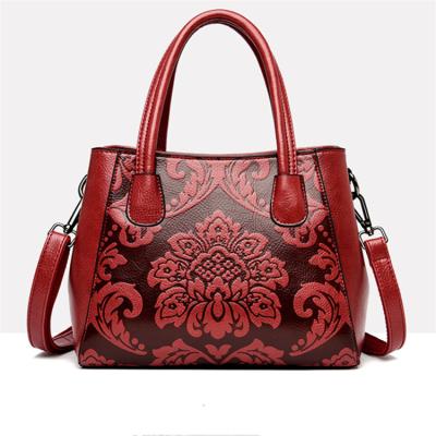 China Large Capacity Chinese Style Embossed Large Capacity Cross - Body Shoulder Bag Designer Brand Luxury Women Handbags for sale