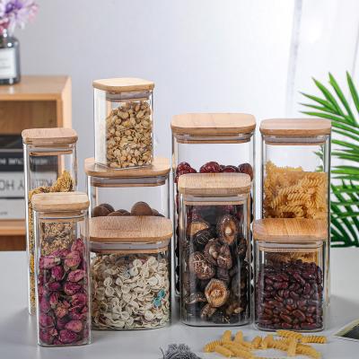 China Freshness Keeping Square Sealed Glass Bottle Storage Jar Tea Coffee Beans Storage Cans Candy Snack Tins With Bamboo Lid for sale