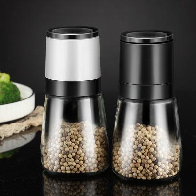 China Viable Kitchen Utensils Manual Jar Salt Grinder Spice Seasoning Bottle Transparent Glass Grain Pepper Mill for sale