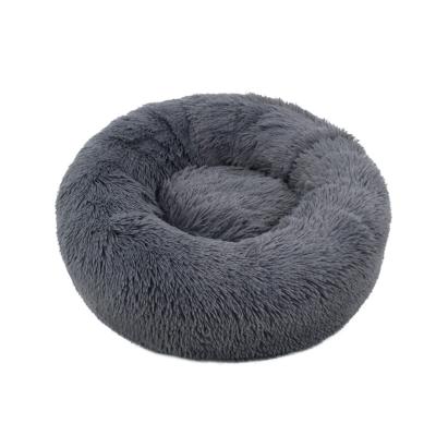 China Pet Shop Mascotas Donut Plush Heating Bed for Pets Dog Soft Fluffy Cat Nest Pet Bed Luxury Bed for sale