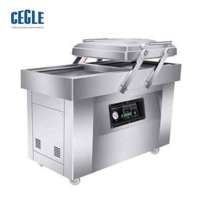 China CLOTHING thermoforming vacuum double chamber pillow type packing smoked chicken machine DZ 400 2f for sale