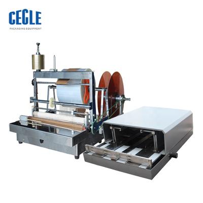 China Economic Efficient Beverage Perfume Box Cellophane Wrapping Machine for sale