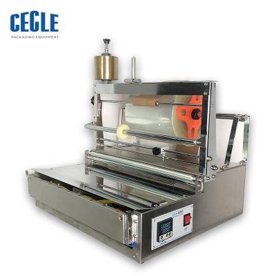 China ACW-88 APPAREL soap box wrapping machine, soap packing machine, soap bar cellophane wrapping machine for sale