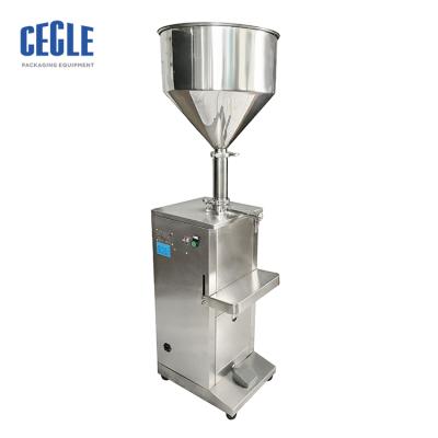 China Hot Selling Beverage Filling Machine Manual Manual Cosmetic/paste/sauce/cream Liquid Filling Machine for sale