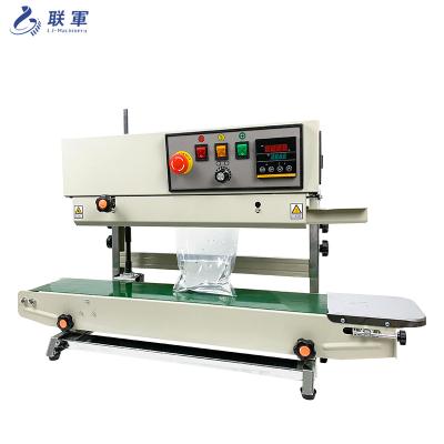 China Food Machine Supplier Lianjun Style Sealing Machine Vertical Plastic Bag Shrink Sleeve Seaming Machine Continuous Tape Sealer for sale