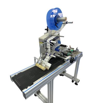 China Automatic Mylar Bag Applicator Pouch Food Flat Surface Labeling Machine with Paging Machine for sale