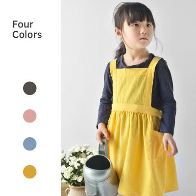 China Custom Logo Children's Cotton Aprons Kids Canvas Kitchen Washable Cooking Yellow Pinafore Dress Apron for sale