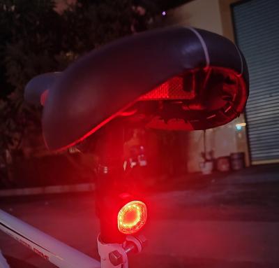 China Abs+pc+silicone UMIONE New LED Bicycle Flash Taillight Night Warning Lights Plastic Cob Rear Bike Light Bulk Buy Bicycle Lights for sale