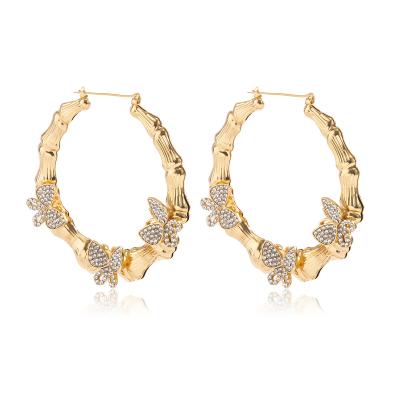 China JM Hyperbole Style Bamboo Hoop Earrings Bamboo Style Custom Twisted Circle Earring With Full Diamond Butterfly for sale