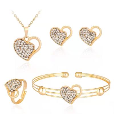 China Hyperbole JM Fashion Women Jewelry Set 18K Gold Plated Heart Shape Cheap Wholesales Bridal Jewelry Set for sale