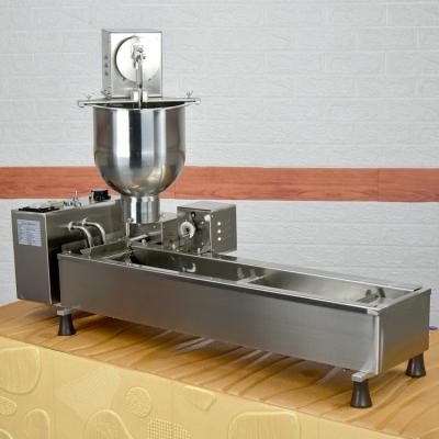 China Free Shipping Bakery To North America Large Production Donut Making Machine Commercial Electric Donut Maker / Donut Frying Machine for sale