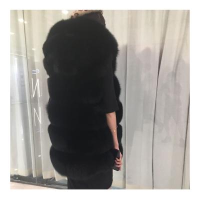 China Sleeveless Black Fur Coat Vest Fuzzy Waistcoat Big Fluffy Fox Fur Hooded Ladies Breathable Hairy Long Vest For Winter for sale