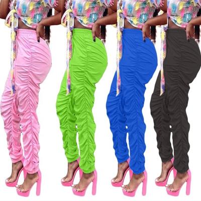 China Lskj846 new fashion women's casual mid-waist hip pants pure color breathable temperament candy color plus size pants for sale