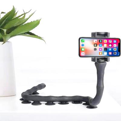 China Free Sample W Shaped Cell Phone Stand Free Sample Bracket Suction Cup Caterpillar Lazy Cell Phone Holder For Kitchen Windshield Bed for sale