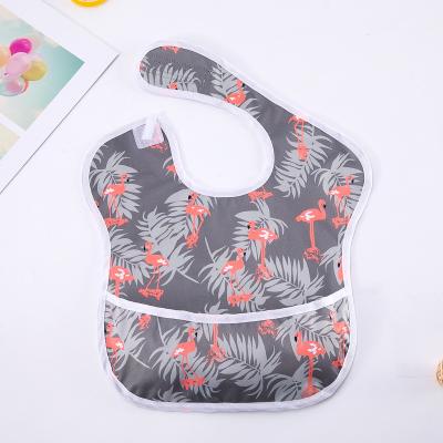 China Sustainable Baby Feeding Bib In Printed Waterproof Fabric PUL for sale