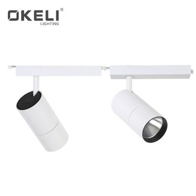 China OKELI Modern Adjustable COB Spot 25W 35W LED Black White Aluminum Track Light Fixture for sale