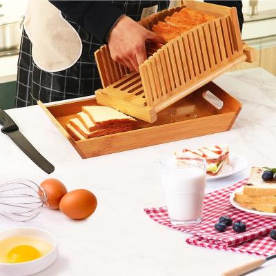 China Foldable Compact Bread Slicer Acacia Wood Bread Cutting Board Bread Bin Chopper Bamboo Slicer Viable Thickness With Crumb Tray for sale