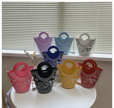 China PC 2021 new bag women bag cashew flower rivet jelly purse handbags for women purses bucket bag tis handbag for sale