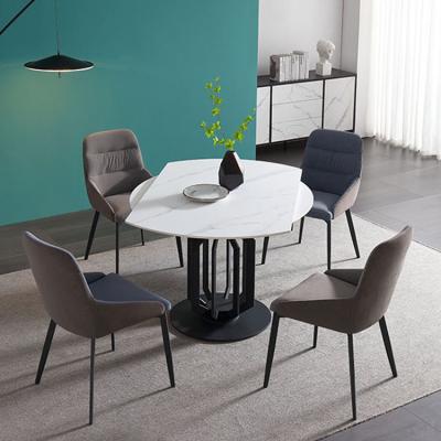 China Expandable Agglomerated Stone Round Dining Room Furniture Expandable Dining Tables for sale