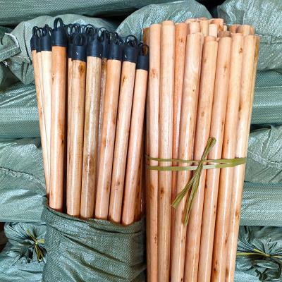 China Best Guangxi Home Factory Price Varnished Wooden Broom Stick Broom Handle With Plastic Hook for sale