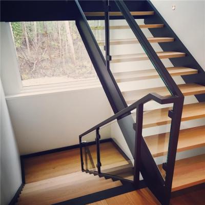 China Large modern home curved glass fencing spiral marble stairs for sale