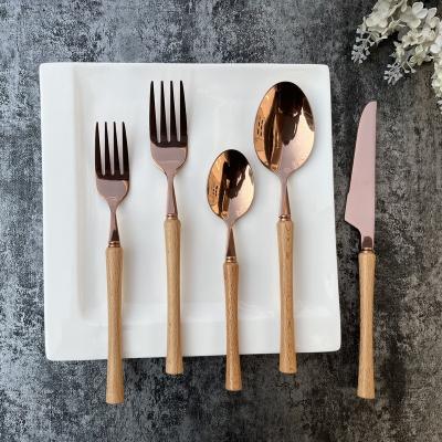 China Viable 5-Piece Set Wooden Flatware Set 18/10 Rose Gold Stainless Steel Silverware Flatware Set with Real Natural Beech Wood for sale