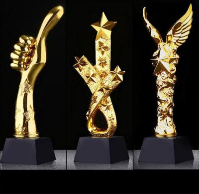 China Europe star shape design special resin crystal trophy for best employee award / sports champion trophy souvenir award for sale