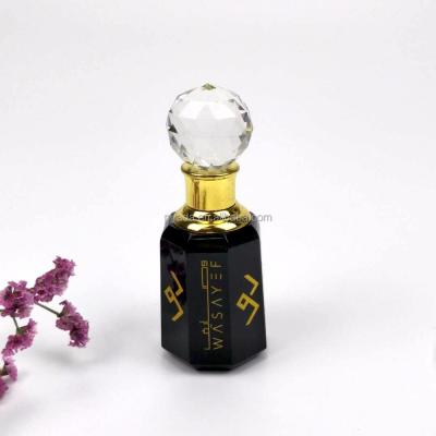 China Obsidian luxury empty arabic style middle east octagon black 3ml essential oil bottle k9 crystal perfume bottle for sale