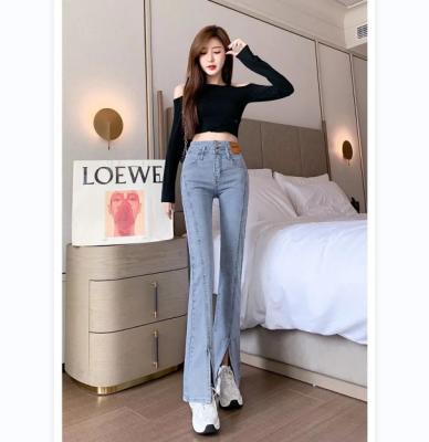 China 2022 Fashion Street Style QUICK DRY Slit Flared Waisted Jeans Pants High Waisted Women Casual Straight Elastic Women's Slim Double-Button Jeans for sale